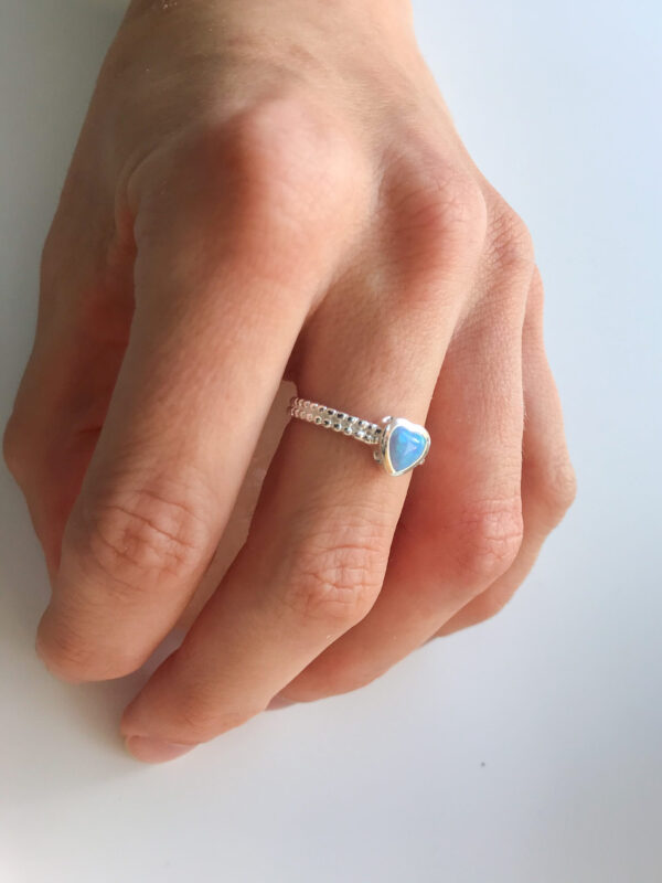 Blue opal heart ring on hand Wildwood Cornwall small business