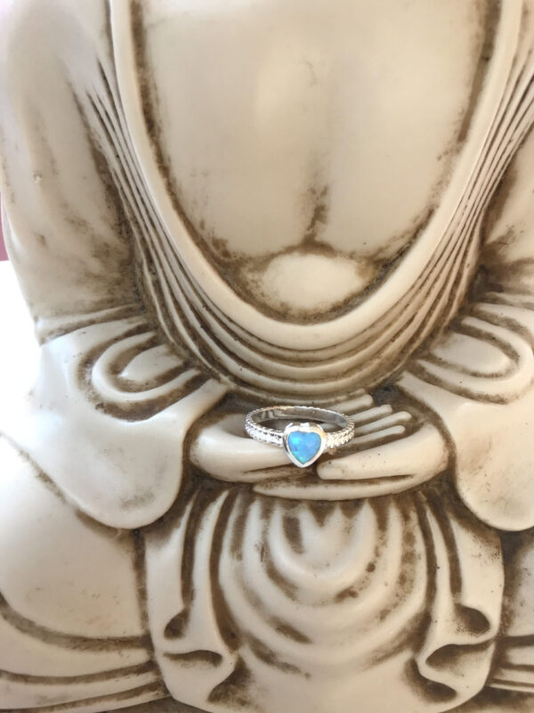 Blue opal heart sterling silver ring on buddha