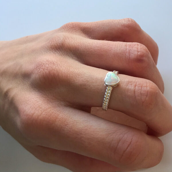 White opal heart ring on hand Wildwood Cornwall