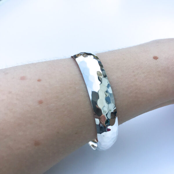 sterling silver hammered bangle on wrist Wildwood Cornwall bude