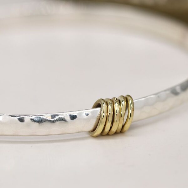 Hammered sterling silver bangle with brass rings Wildwood COrnwall Bude
