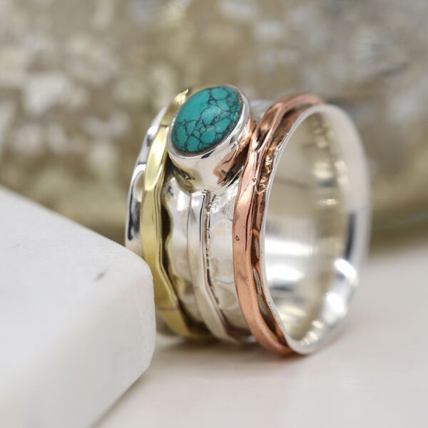 spinning ring with turquoise stone and copper:brass spinner Wildwood Cornwall