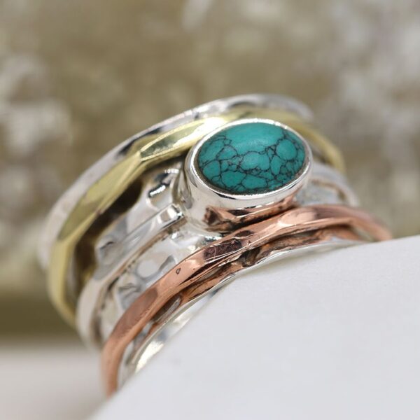 sterling silver spinning ring turquoise with copper:brass bands Wildwood Cornwall