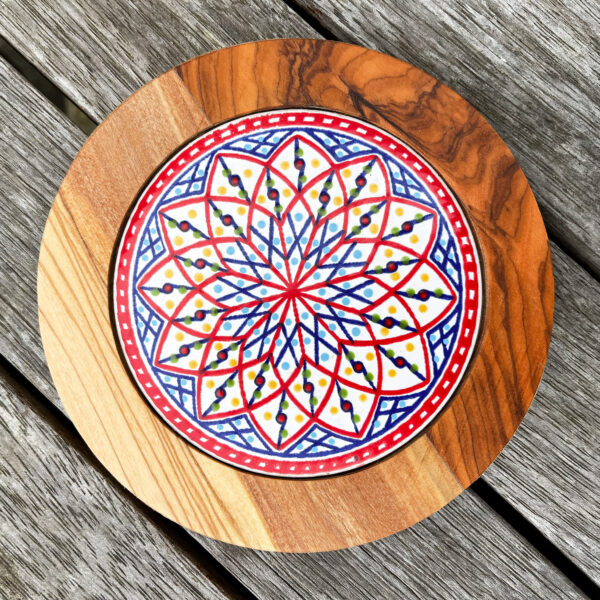 round olive wood trivet with tile Wildwood Cornwall Bude