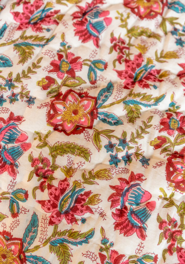 Red and blue floral quilt bed spread Wildwood Cornwall Bude fair trade
