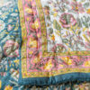 Teal and pink floral fair trade quilt Wildwood Cornwall Bude