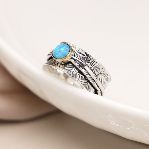 Sterling silver spinning ring with opal and leaf embossed Wildwood Cornwall