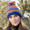 Rainbow bobble hat pachamama wildwood cornwall